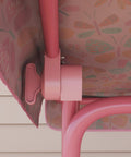 Close-up of Kids 2 Seater Patio Porch Swing With Adjustable Canopy And Safety Belt Pink Butterfly Pattern Hanging Swing Bench for Garden And Backyard Sturdy Steel Frame With Non Slip Feet.