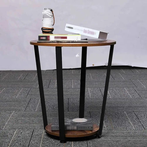 Round Two Tier Side Table With Open Storage Shelf, Anti Scratch Protective Pads, Kid Safe Curved Edges, Straight Up Sturdy Metal End Table For Cozy Living Rooms And Bedrooms with books and decor.