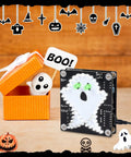 Skull Ghost Soldering Project Kit For DIY Practice With Flashing Lights, showcasing ghost PCB board with glowing eyes on a table.