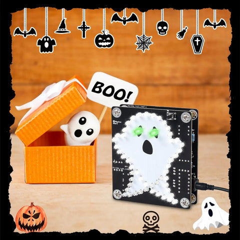 Skull Ghost Soldering Project Kit For DIY Practice With Flashing Lights, showcasing ghost PCB board with glowing eyes on a table.