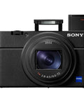 Front view of RX100 VII Premium Compact Camera Bundle With Pro Features On The Go showing lens and flash in black finish.