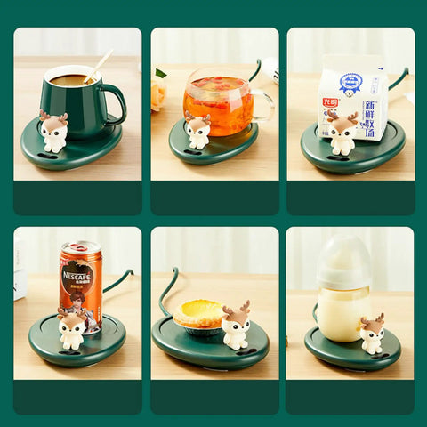 Smart Coffee Mug Warmer Set It And Forget It Design Automatic Gravity Detection Touch Controls Three Heat Levels Desk Beverage Heater To Keep Your Daily Grind Piping Warm with green mug and playful reindeer design.
