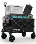 Heavy Duty Collapsible Folding Wagon With 350 Lb Haul Capacity loaded with camping gear, featuring silent universal wheels and cup holders.