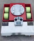Heavy Duty 25 Ton Electric Machine Dolly Skate With 360 Degree Rotating Remote Control displayed on concrete floor