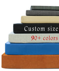 Stack of custom size indoor outdoor bench cushions in various colors, showing waterproof material and double piping options.