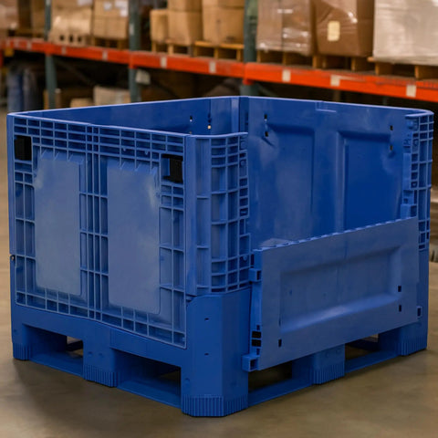 Heavy Duty Collapsible Bulk Box 48x40x33 Inch Plastic Storage Tote with drop doors in warehouse setting.