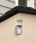 Corner view of Slide-Lid Resin Outdoor Storage Shed For Backyard Gear And Tools, Weather Resistant Beige Brown, 5 By 6.5 Ft with padlock