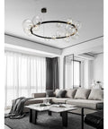 High Quality Top Shelf Modern Metal Chandelier With Clear Glass Bubbles And G9 Sockets in elegant living room setting.