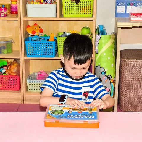 Child interacting with Hands On Electricity And Magnetism Science Kit For Middle School And High School Students With Nine Experiments