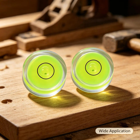 Two 4Pcs Small Circular Bubble Levels, Double Sided Adhesive Bottom Mini on wood, showing vibrant green liquid and level bubbles.
