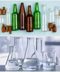 Assorted glass bottles and laboratory glassware on a light background, including brown and green bottles and clear beakers and flasks