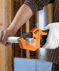 Person using Beefy Pro Grade PVC Pipe Cutter, Aluminum Ratchet Tool That Cuts Up To 2.5 Inches, on white plastic pipe