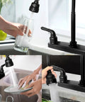 Heavy Duty Rv Kitchen Faucet Built Tight For Campers And Vans Smooth Turning 360 Head Delivers A Clean Stream Or Slick Spray No Sweat Eight Inch Two Hole Swap Tailored For Road Trips And Overland Setup. Top view of a black RV kitchen faucet spraying water into a glass.