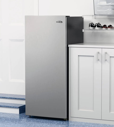 7 Cu Ft Upright Convertible Refrigerator And Freezer With Manual Defrost And Garage Ready Build In Brushed Stainless Steel in a modern kitchen setting.
