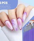 Close-up of manicured nails with purple designs and Nail Art Tools Set With 23 Pcs Brushes And 5 Pcs Dotting Tools displayed.