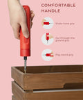 Person using Ultra Handy Cordless Electric Screwdriver With 3.6V USB Rechargeable Battery on wooden box with grip styles shown.