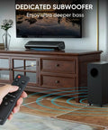 Home setup featuring 2.1 Channel Sound Bar With Subwoofer For TV And PC Gaming Kickin Bass For Movie Night Deep Bass Home Theater System