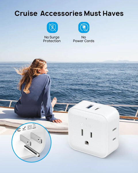 Six In One Wall Outlet Extender With USB C And USB A Ports, 3 Type A Sockets, 1 Type B shown on a boat with cruise essentials.