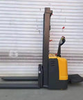 Heavy Duty Electric Warehouse Stacker And Powered Pallet Lifter For Smooth Material Handling In Industrial Warehouses, side view.