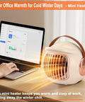Compact Desk Heater For Office And Home Personal 500W PTC Ceramic Space Heater with fast heating on office desk next to laptop