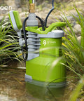 Boss Level 1.5HP Submersible Sump Pump With 5000 GPH Flow, in green, placed in a pond with plants, showing 25 ft cord