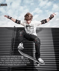 Skateboarder wearing Adult And Youth Knee Pads Elbow Pads With Wrist Guards Protective Gear Set in mid-air