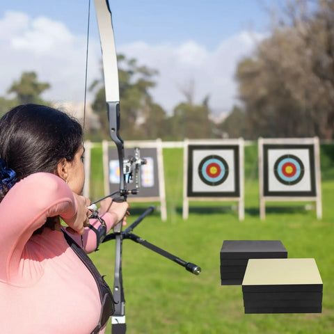 Person aiming at Backyard Archery Target For Adults EVA Foam 20x20x2 Inch Block For Bows Up To 50 Lbs Heavy Duty Practice Target