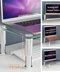 2 Pack Adjustable Monitor Riser Stand For Desk With Height Elevation Ergonomic Lift To Level Up Your Flat Screen LCD LED TV Laptop Notebook Xbox One Space Saving Multi Media Desk Organizer With 0 To 15 Degree Tilt shown with a laptop on tempered glass.