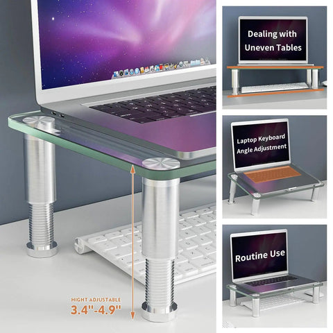 2 Pack Adjustable Monitor Riser Stand For Desk With Height Elevation Ergonomic Lift To Level Up Your Flat Screen LCD LED TV Laptop Notebook Xbox One Space Saving Multi Media Desk Organizer With 0 To 15 Degree Tilt shown with a laptop on tempered glass.