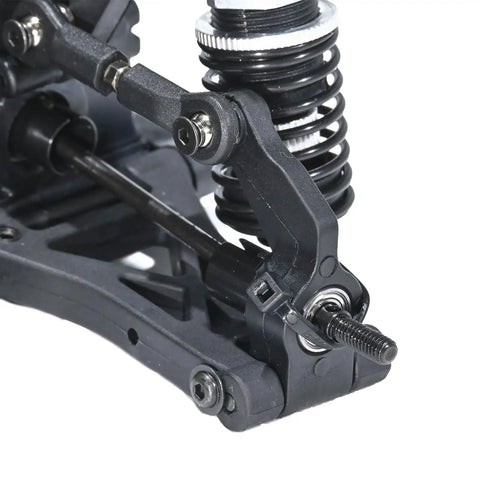 Close-up of One Tenth Scale 4x4 On Road RC Rolling Chassis Frame Kit For Adults, showing suspension and wheel attachment.