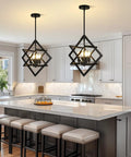 Modern Eighteen Inch Black Chandelier Four Light Industrial Pendant in stylish kitchen above island.
