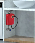 Sleek Red Instant Tankless Electric Water Heater, 3000W On Demand Wall Mount Unit installed under a sink.