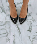 Feet standing on Opaline Peel And Stick Floor Tiles White Marble Look Vinyl Flooring for Kitchen Bathroom Entryway