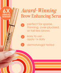 Hand holding Brow Boosting Serum For Fuller, Bolder Brows And Your Brow Game With Vitamins, Peptides, Antioxidants And Amino Acids