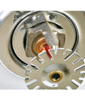 Sleek Recessed Fire Sprinkler Escutcheon Trim Ring Covers 1/2 Inch Ips Pipes showing installation over a sprinkler head, chrome finish.