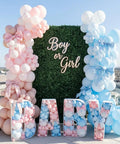Pastel Pink and Blue Gender Reveal Balloons Set 60 Pack 12 Inch Includes 20 Pink 20 Blue 10 Pink Bow Print 10 Blue Bow Print Balloons Plus Ribbon for Easy Decorating Perfect for Baby Shower or Boy or Girl Reveal displayed in a decorative setup