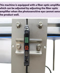 Industrial Grade Automatic Flat Surface Label Applicator With Touchscreen Control And Auto Photo Sensor showing fiber optic amplifier for adjustment.