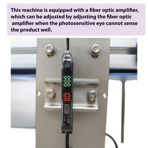 Industrial Grade Automatic Flat Surface Label Applicator With Touchscreen Control And Auto Photo Sensor showing fiber optic amplifier for adjustment.