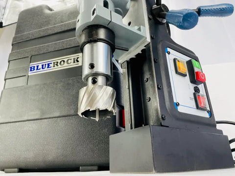 Knockout Performance Heavy Duty Magnetic Drill Press Built Like A Tank For Real Contractors With Two Speed Settings Three Inch Capacity And 1850 Watt Muscle For Any Metal Project close-up of drill bit and control panel.