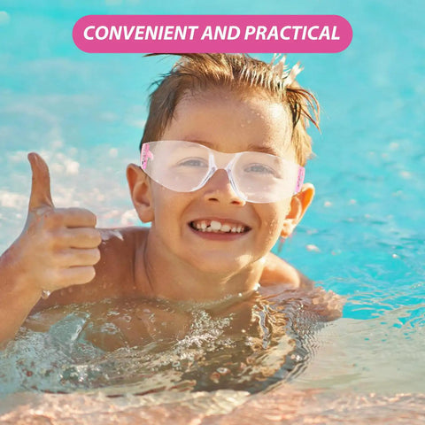 Child wearing Heavy Hitting Splash Guard Safety Glasses in pool, smiling with thumbs up, showing impact resistant protection.