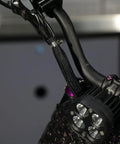 Close-up of 4 to 5 inch E Bike Cable Management Sleeve on handlebars showing split sleeve design for off-road electric motos and dirt bikes.