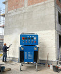 Portable Electric Polyurea Spray Gun Machine For Roof Insulation Foam And Protective Coating fast acting setup in action on a wall.