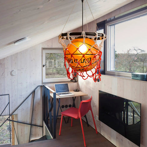 Basketball Hoop Pendant Light With Net and Acrylic Shade in loft setting, red net, simple install kit included, vintage style.