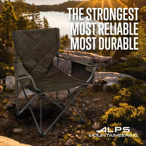 King Kong Camping Chair For Adults With Mesh Cup Holders And Extra Pockets, shown outdoors on rocky terrain.