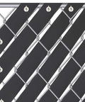 Chain Link Fence Privacy Tape 164 Ft By 6 In PVC Slats Privacy Screen installed on fence with snap fasteners visible