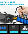 Portable Capacitor Spot Welder With Crisp LCD Display And 120 Pulse Controls For Effortless 18650 Battery Packing And Slim Nickel Strips in use.