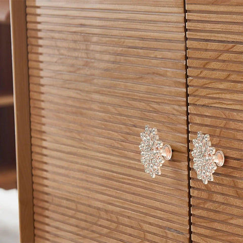 Four Piece Flower Shape Cabinet Knob Set In Rose Gold With Crystal Glass Pull Handles For Cabinets, Drawers, Dressers, Wardrobes, Closets And Other Furniture With Screws That Look Ultra Cool installed on wooden cabinet