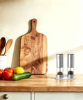 Touch Activated Automatic Electric Spice Grinder With Soft Glow LED Light Salt And Pepper Mill For Kitchen Countertop on kitchen countertop.