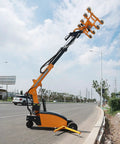 Heavy Duty Mobile Hydraulic Glass Vacuum Lifter With Battle Hardened Suction Cups positioned on pavement outdoors.
