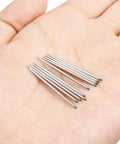 10-piece 16G Straight Piercing Taper Insertion Pin Set for internally threaded nose septum rings in a hand